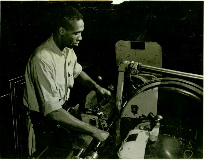 An African American Worker Grinding Barrels for Rifles