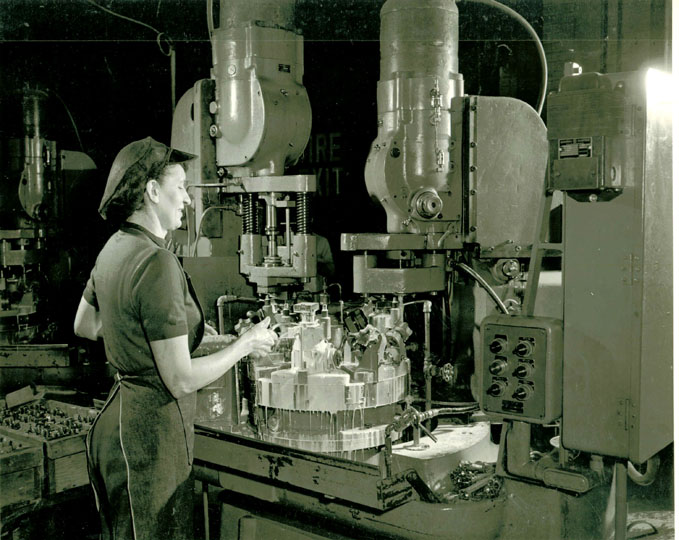 Woman Operating Machine 